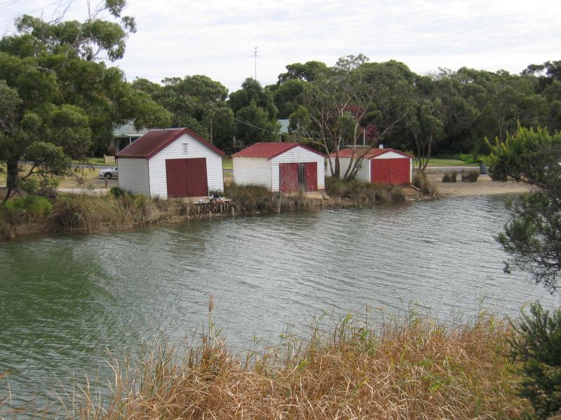 Anglesea - Anglesea River through the town and surroundings: View west across Anglesea River towards boat houses on River Reserve Road