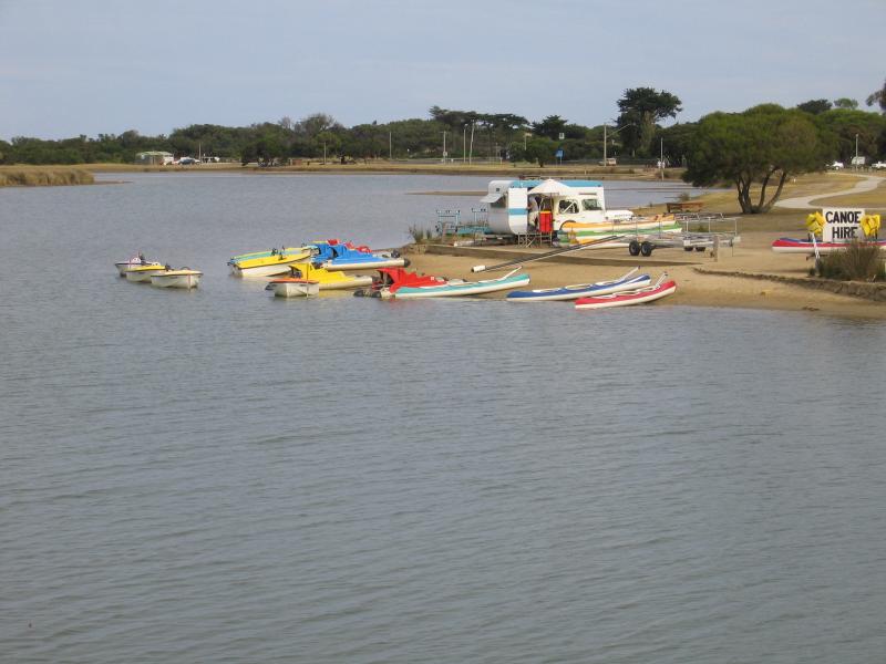 Anglesea - Anglesea River through the town and surroundings: View south along Anglesea River from bridge at Great Ocean Road towards boat hire