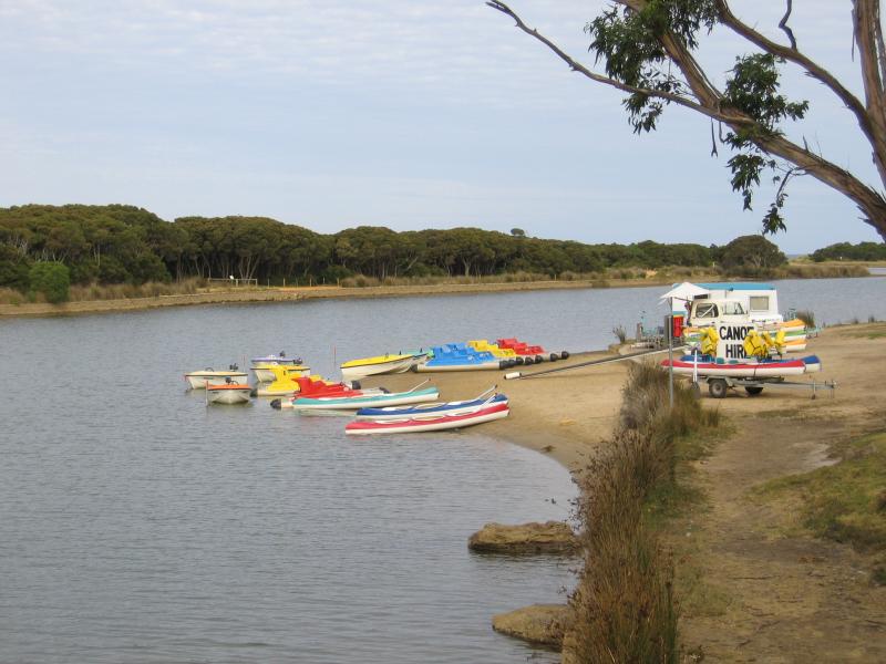 Anglesea - Anglesea River through the town and surroundings: View south along Anglesea River from bridge at Great Ocean Road towards boat hire