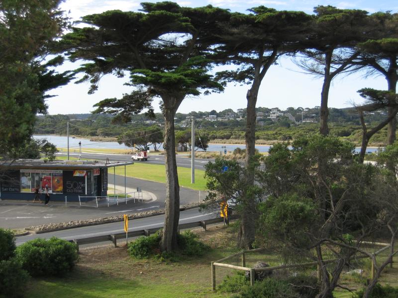Anglesea - Shops, Great Ocean Road at Tonge Street: View east along Great Ocean Road towards bend at Anglesea River from walking track to Surf Beach