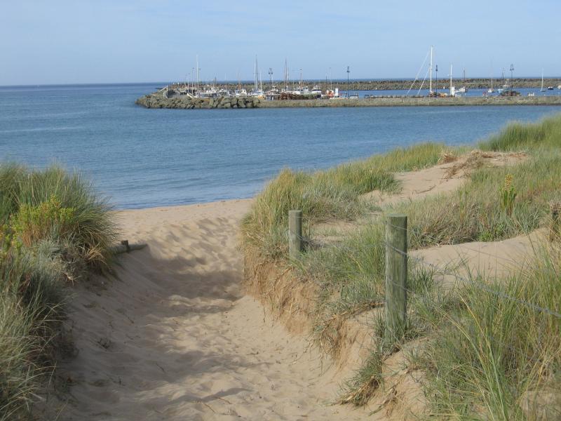 Apollo Bay - Beach in town centre: View towards wharf from beach near Moore St