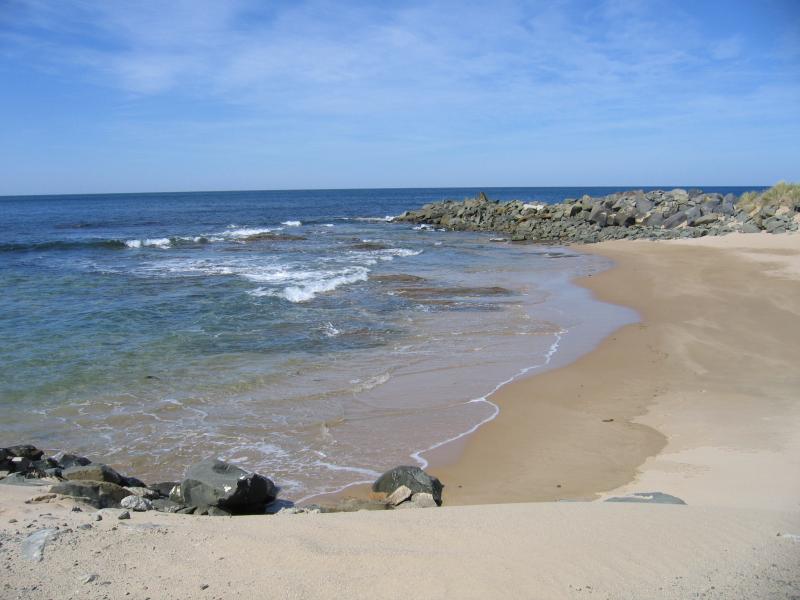Apollo Bay - Boat Harbour, wharf and breakwater: Beach and rocks at Point Bunbury viewed from breakwater