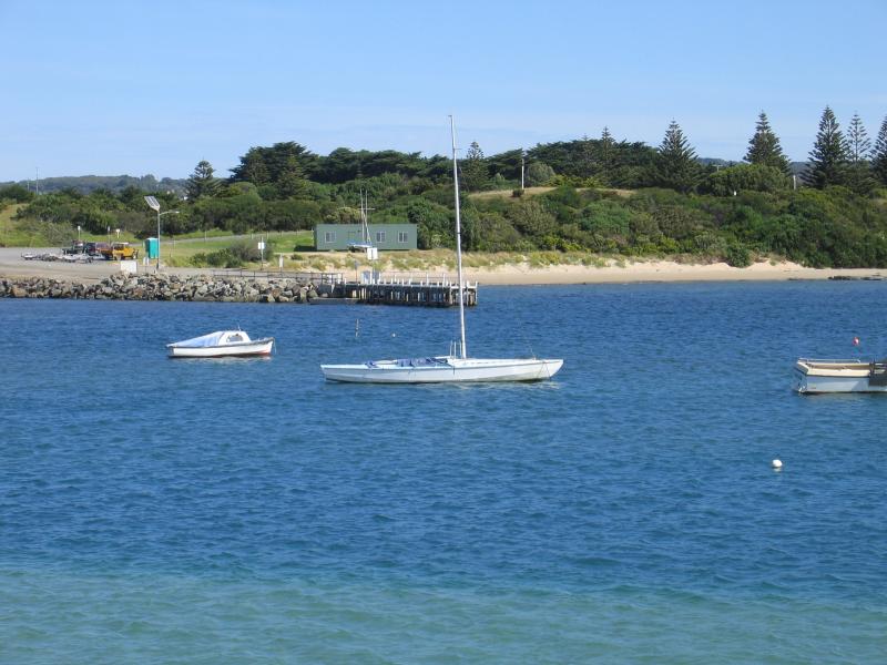 Apollo Bay - Boat Harbour, wharf and breakwater: View across harbour from breakwater towards boat ramp and jetty