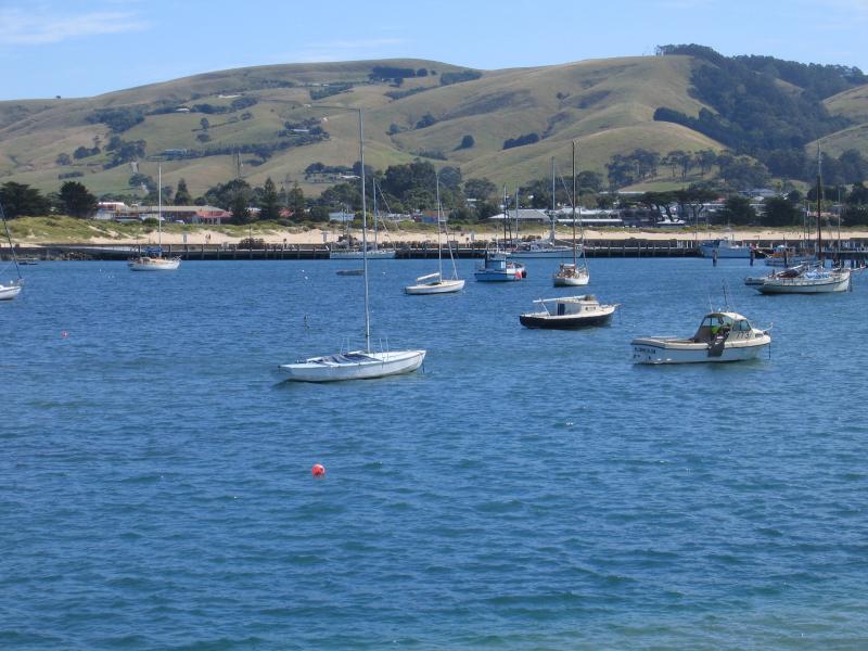 Apollo Bay - Boat Harbour, wharf and breakwater: View west across harbour towards town centre