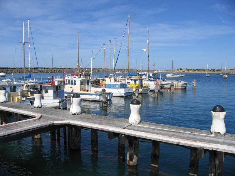 Apollo Bay - Boat Harbour, wharf and breakwater: View of harbour and boats from wharf