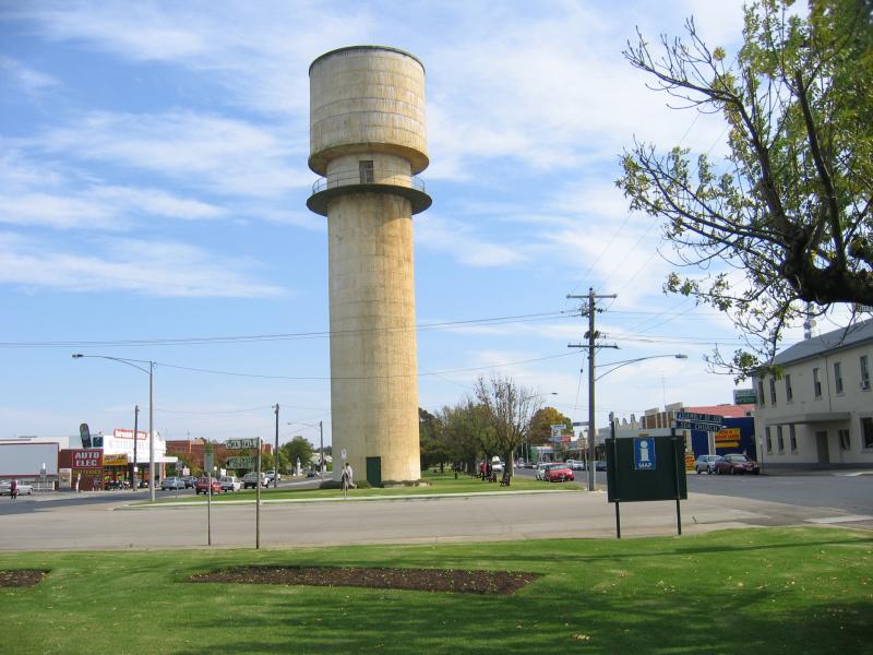 Bairnsdale - Commercial centre and shops: Water tower, view west along Main St at Pyke St