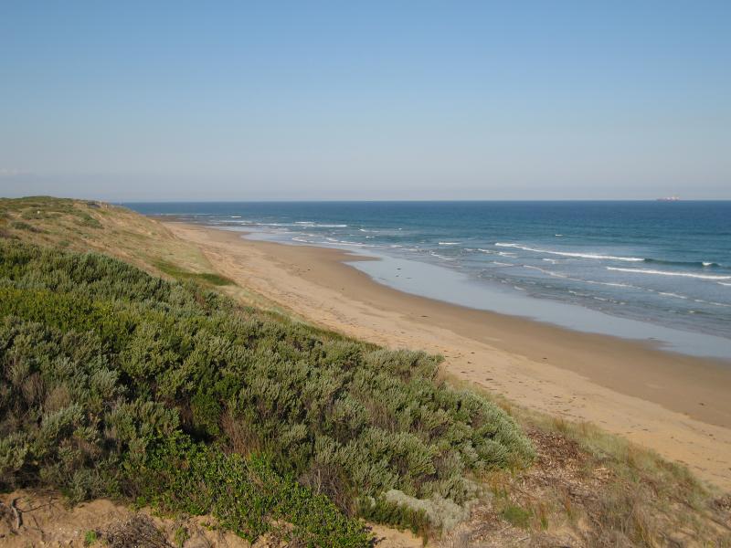 Barwon Heads - Thirteenth Beach fronting Bass Strait: View east along beach at SLSC