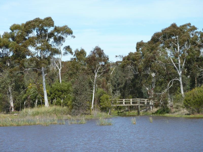 Beaufort - Beaufort Lake: View across lake towards footbridge on southern side of lake