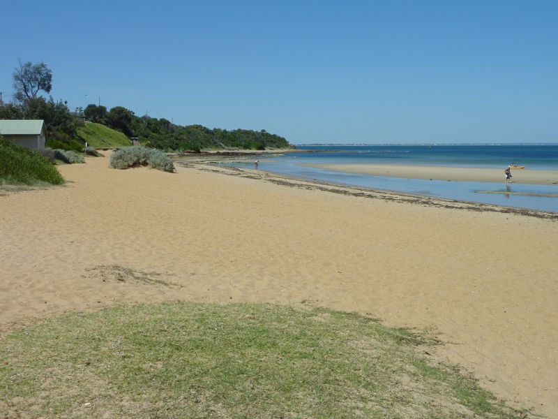 Beaumaris - Beach and cliff top path near Beaumaris Life Saving Club: Easterly view along beach