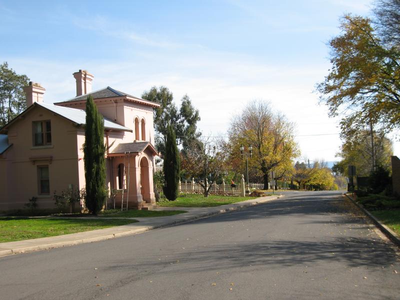 Beechworth - La Trobe University: View along entrance driveway towards gate house and Albert Rd