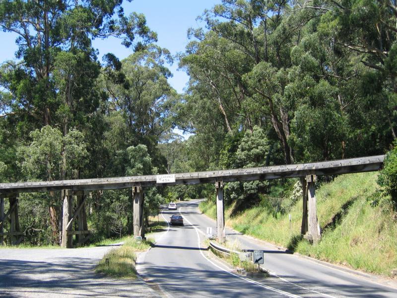 Belgrave - Puffing Billy viewing area, Gembrook Road at railway bridge: View east along Gembrook Rd towards bridge