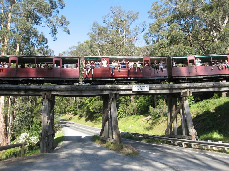 Belgrave - Puffing Billy viewing area, Gembrook Road at railway bridge: Puffing Billy carriages on bridge over Gembrook Rd