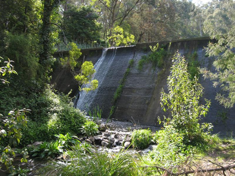 Belgrave - Belgrave Lake Park: Monbulk Creek at base of Dandenong Reservoir dam wall