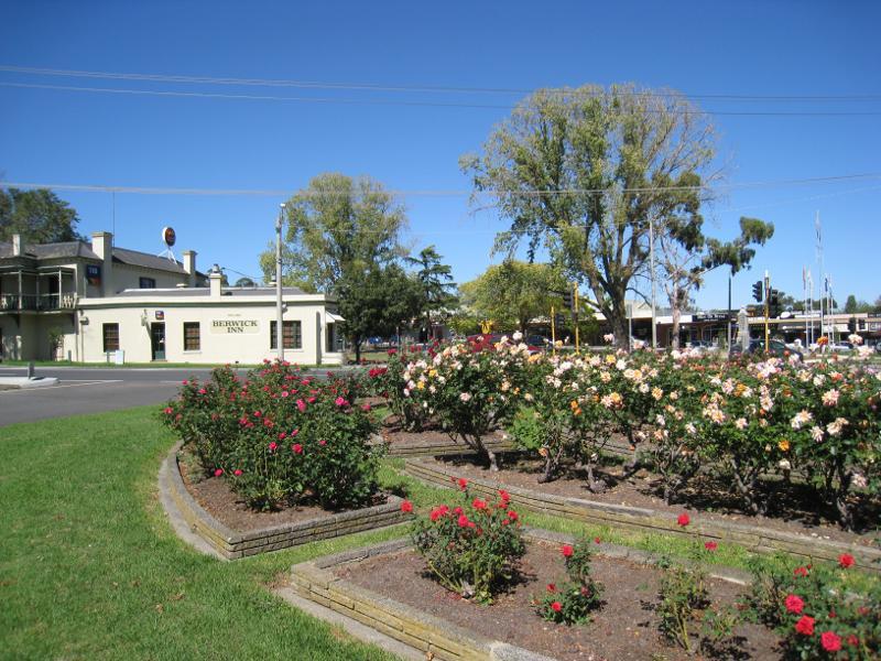 Berwick - Commercial centre and shops, High Street: Rose garden, corner High St and Lyall Rd