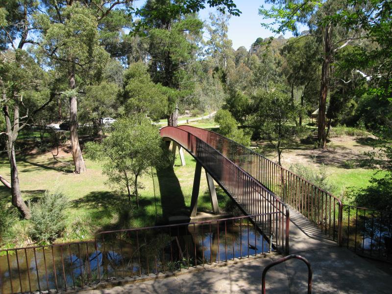 Blackwood - Mineral Springs Reserve at Lerderderg River, Golden Point Road: View along footbridge towards picnic areas and car park