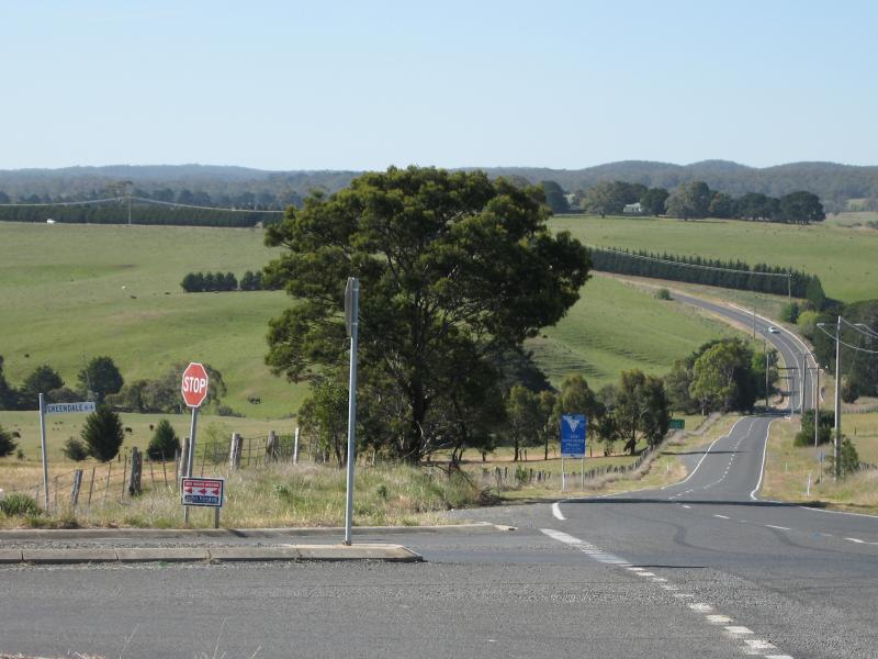 Blackwood - Village of Greendale, south of Blackwood: View north along Trentham Rd at Pykes Creek Rd, south of Greendale