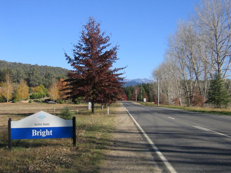 Bright - Great Alpine Road east of Bright - Bright town sign, view west along Great Alpine Rd