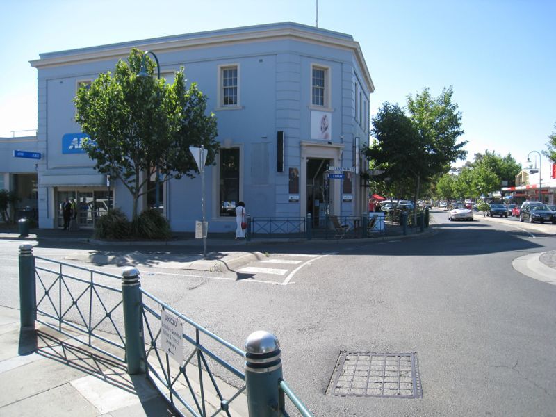 Brighton - Shops along Church Street: View north-east along Church St at Carpenter St