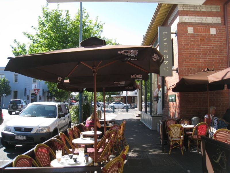 Brighton - Shops along Church Street: View north-west along Church St towards Laurent Patisserie and Carpenter St