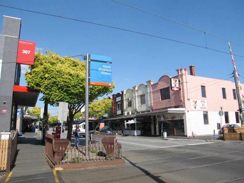 Brighton - Shops along Bay Street: View east along Bay St at railway crossing