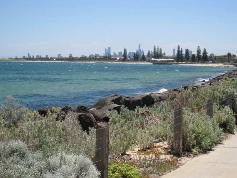 Brighton - Foreshore and beach at end of North Road - View north-west across bay towards city skyline from near playground