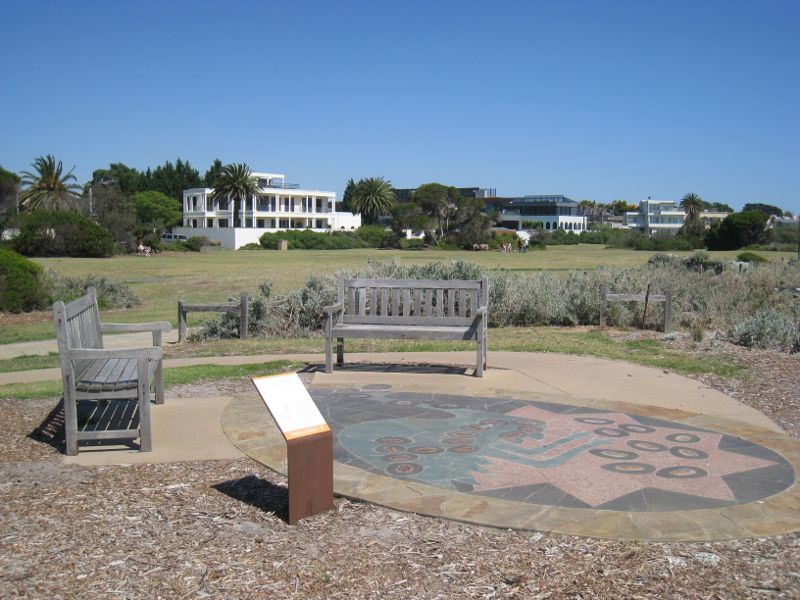 Brighton - Beach and coastline between North Road and Middle Brighton Pier: Seating and parkland around 'The Barraimal' artwork, south of jetty