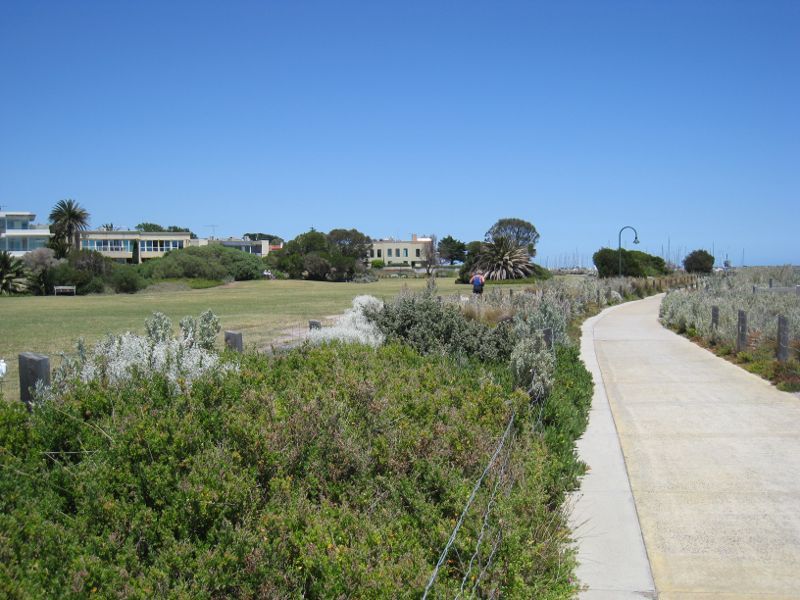 Brighton - Beach and coastline between North Road and Middle Brighton Pier: View south through parkland and coastal path