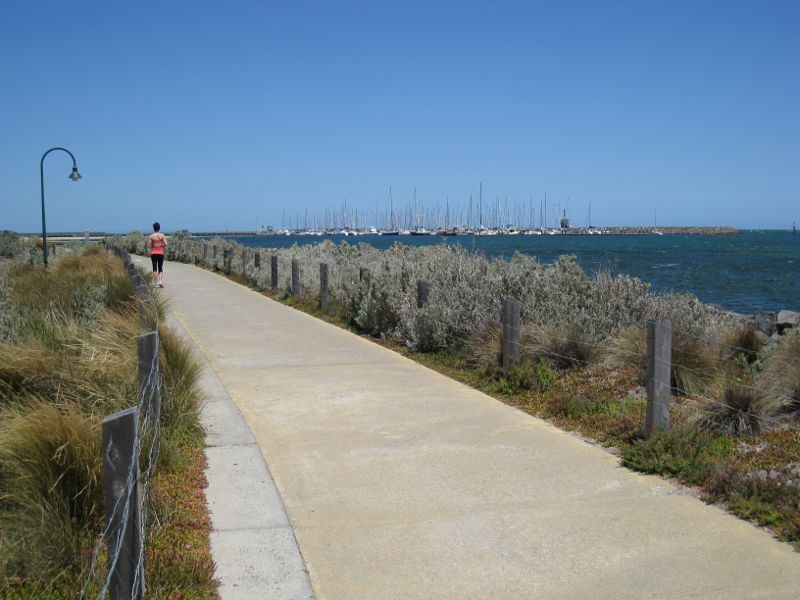 Brighton - Beach and coastline between North Road and Middle Brighton Pier: South-easterly view along coastal path towards marina