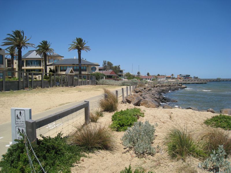 Brighton - Beach and coastline between North Road and Middle Brighton Pier: View south along coastal pathway towards Sandown St