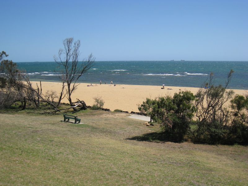 Brighton - Beach and coastline at Middle Brighton Beach: View from foreshore park towards beach