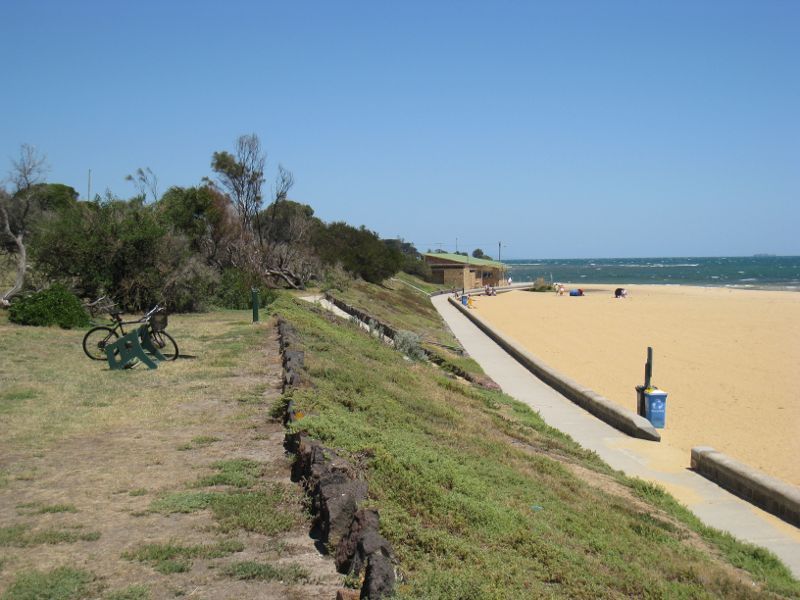 Brighton - Beach and coastline at Middle Brighton Beach: View south along foreshore and beach towards Brighton Life Saving Club