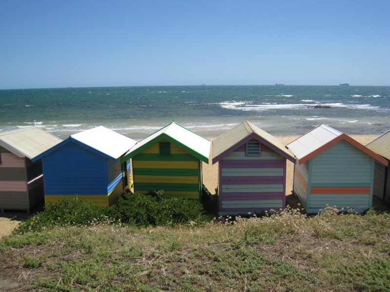 Brighton - Beach, coastline and bathing boxes at Dendy Street Beach: View from back of bathing boxes towards beach