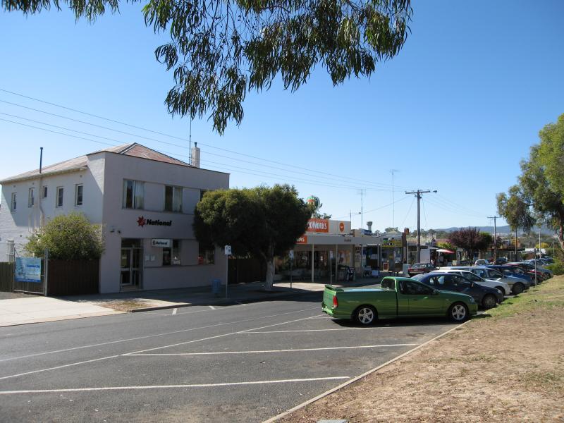 Broadford - Commercial centre and shops, High Street: View north-east along High St service road east of Hamilton St