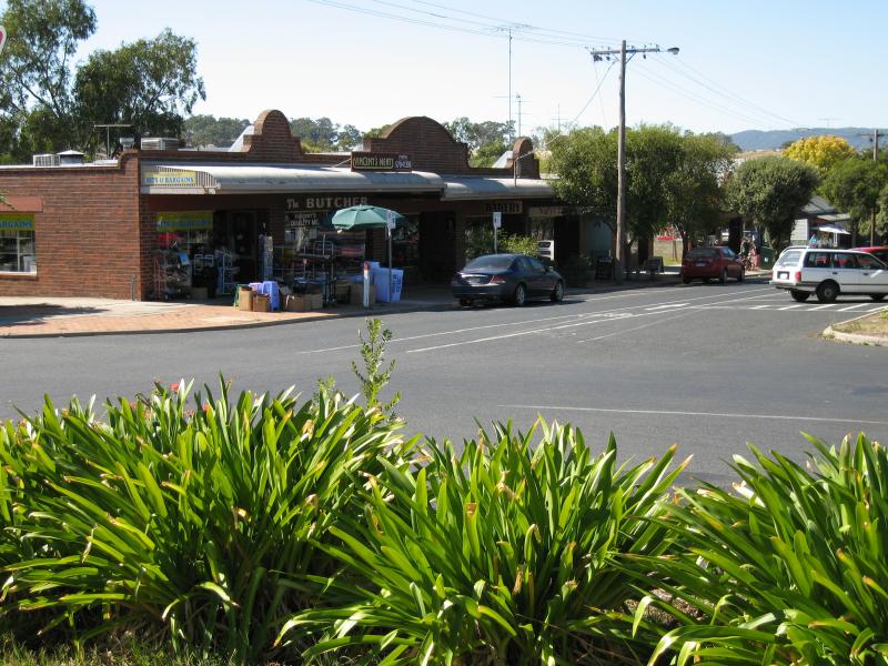 Broadford - Commercial centre and shops, High Street: View north-east along High St service road at Powlett St