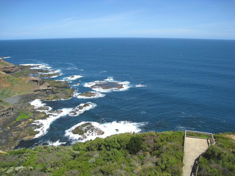Cape Schanck - Cape Schanck Lighthouse Reserve, end of Cape Schanck Road: From top of lighthouse, view south towards lookout at base