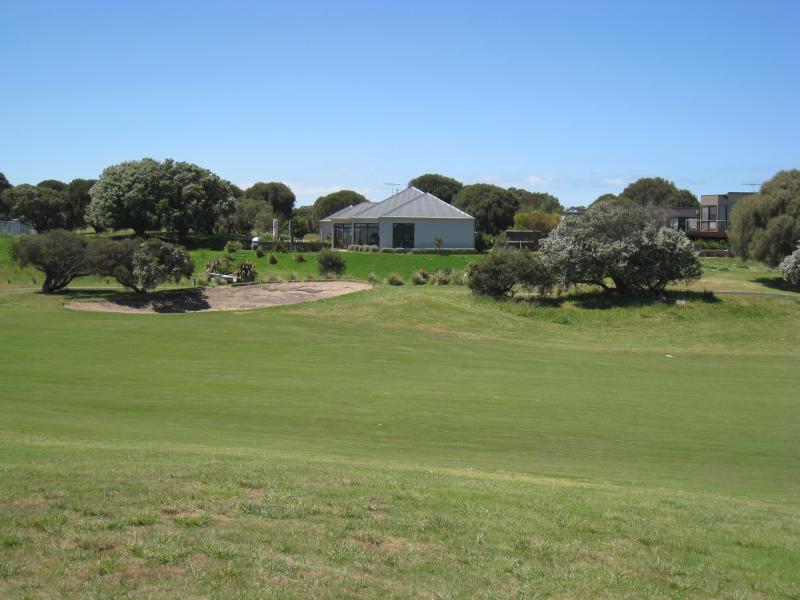 Cape Schanck - Cape Schanck Resort & Golf Course, Trent Jones Drive: View east across golf course greens towards housing along southern end of Casuarina Dr