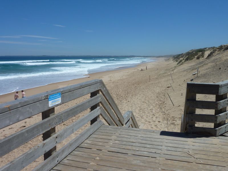 Cape Woolamai - Woolamai Surf Beach at surf lifesaving club, Woolamai Beach Road: View north-west along beach from walkway to car park