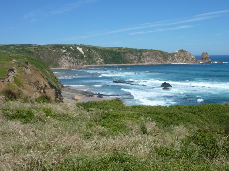 Cape Woolamai - Cape Woolamai Trail near Magic Lands Beach: View from trail across beach towards The Pinnacles