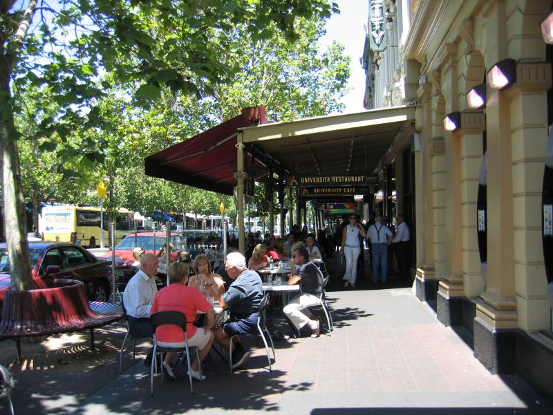 Carlton - Lygon Street, commercial centre and restaurants: Outdoor dining at the University Cafe, Lygon St between Grattan St and Faraday St
