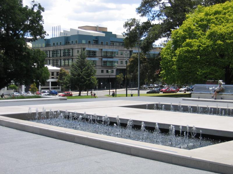 Carlton - Lincoln Square, between Swanston Street and Bouverie Street: Fountain, view west through Lincoln Square