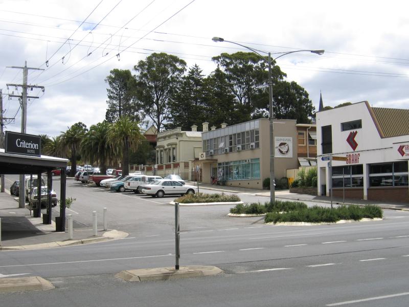 Castlemaine - Shops and commercial centre along Barker, Mostyn and Lyttleton Streets: View west along Mostyn St at Barker St