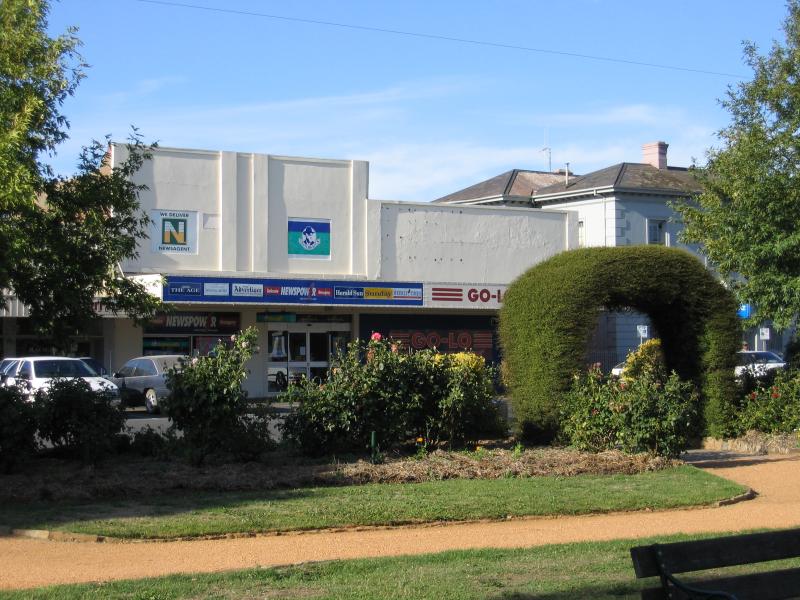 Castlemaine - Shops and commercial centre along Barker, Mostyn and Lyttleton Streets: View north to shops on Mostyn St from gardens