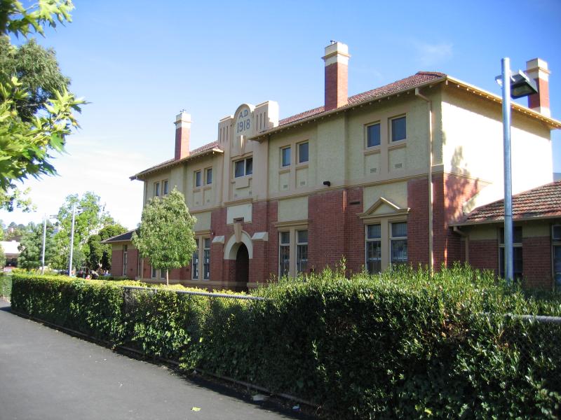 Castlemaine - Shops and commercial centre along Barker, Mostyn and Lyttleton Streets: IGA supermarket (former technical school with original facade retained), Mostyn St entrance