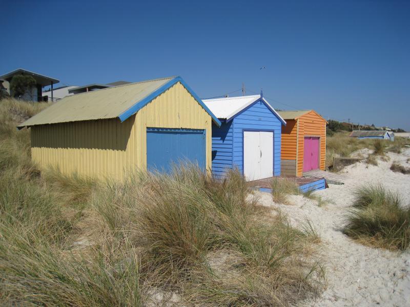 Chelsea - Beach and foreshore south of pier: Bathing boxes on beach