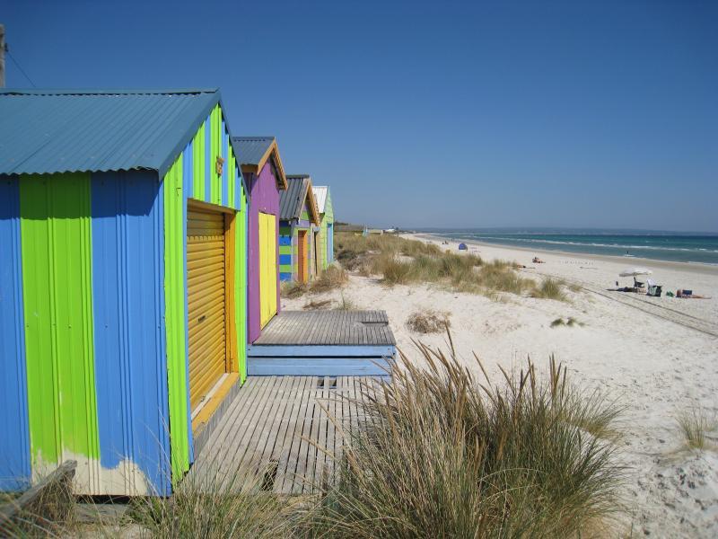 Chelsea - Beach and foreshore south of pier: Southerly view along beach at bathing boxes