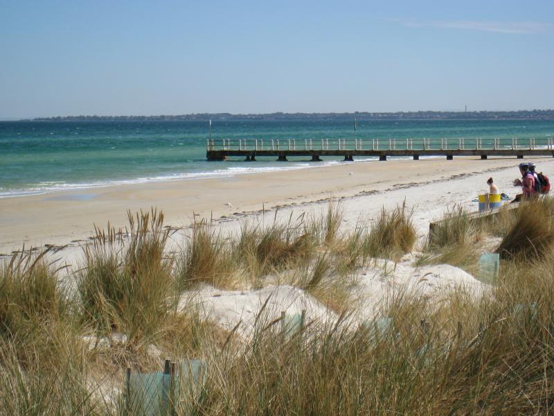 Chelsea - Beach and foreshore south of pier: View north-west across beach towards pier