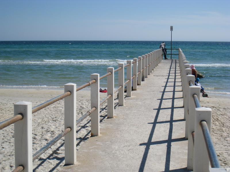 Chelsea - Beach and foreshore around pier and north of pier: View along pier