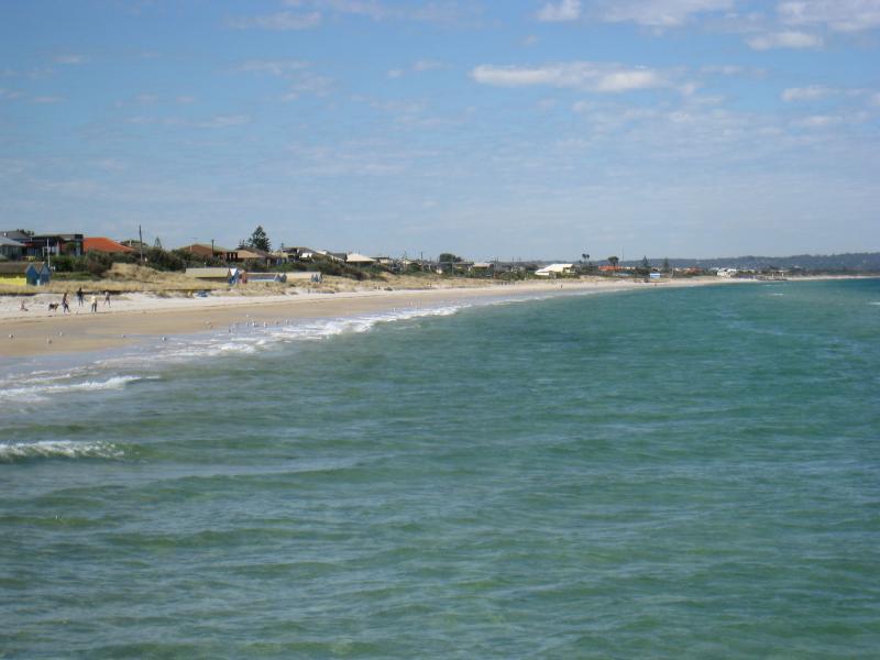 Chelsea - Beach and foreshore around pier and north of pier: View south along coast from pier