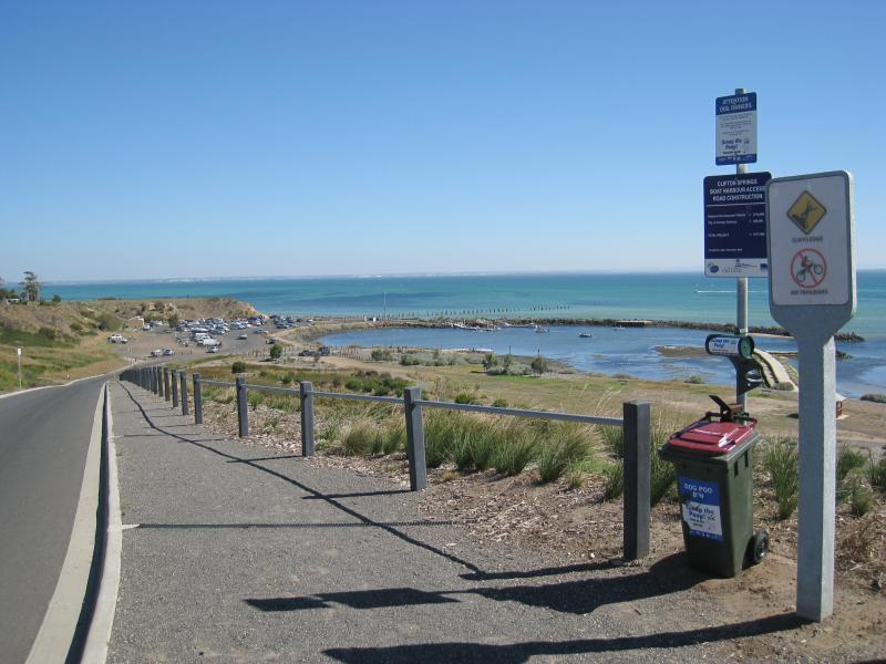 Clifton Springs - Adrian Mannix Reserve and views of Clifton Springs Boat Harbour: View along start of access road at north end of Jetty Rd towards boat harbour