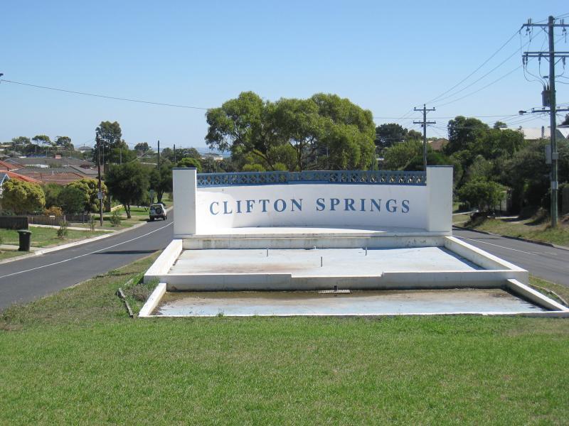 Clifton Springs - Bay Shore Avenue - Clifton Springs sign, view west along Bay Shore Av at Beacon Point Rd